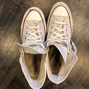 Chuck Taylors women’s 10 Mens 8